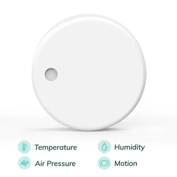 RuuviTag Bluetooth sensor, white round sensor with a small hole, with icons for temperature, humidity, air pressure, motion
