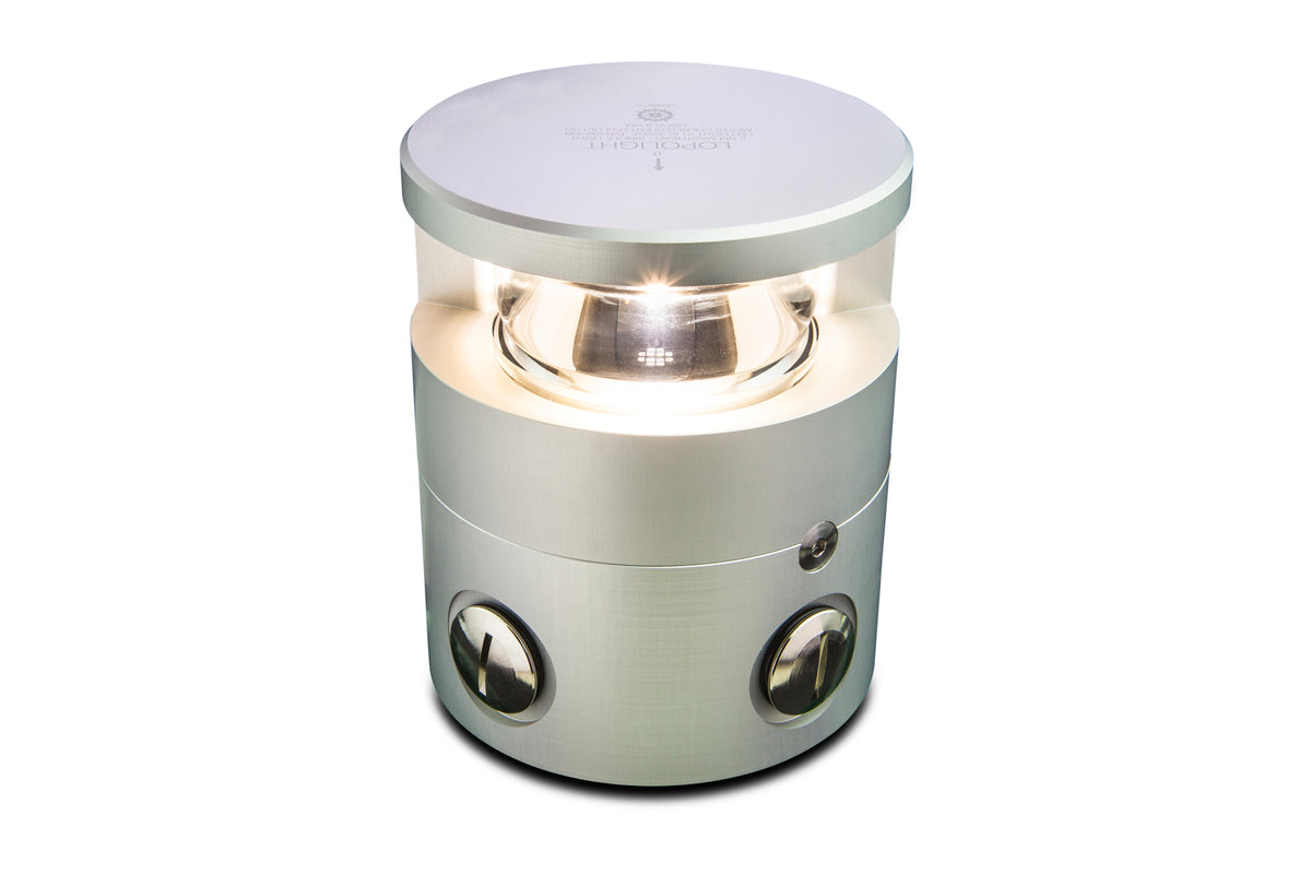 Lopolight NL300-136 silver 225° masthead light, front view of the lit lens and round base with two cable ports