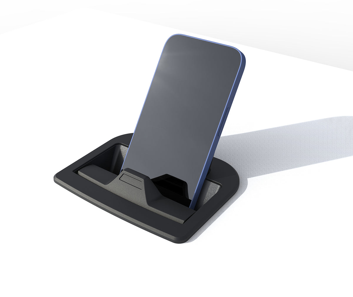 Scanstrut SC-CW-12F Aura magnetic wireless charger holding a phone upright in its recessed black cradle