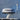 Scanstrut APT-LB-01 lightbar fitted beside a Simrad radome, arm carrying a small white light at the top