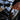 Fusion Apollo MS-RA800 010-02937-01 stereo in a boat dash, hand touching the display beside a joystick