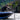 Garmin Force Kraken 010-02573-10 black trolling motor in use on a bass boat, angler landing a fish