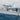 Sportfishing boat with anglers on deck and radar arch overhead, lifestyle image for Scanstrut APT-250-02 PowerTower