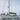 Cruising yacht moored among ice and mountains with a radome on a mast-mounted self-levelling bracket
