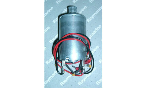 Raymarine Q100 ST2000 tiller pilot motor assembly, small silver electric motor with red and black wires on a mat