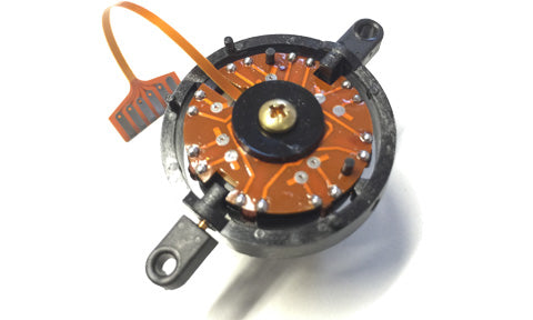 Raymarine M022 micro fluxgate autopilot compass, round black sensor with orange circuit film and a gold centre screw