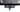 ROKK RL-511 1/4 inch camera plate, threaded stud underneath a black surface beaded with water droplets