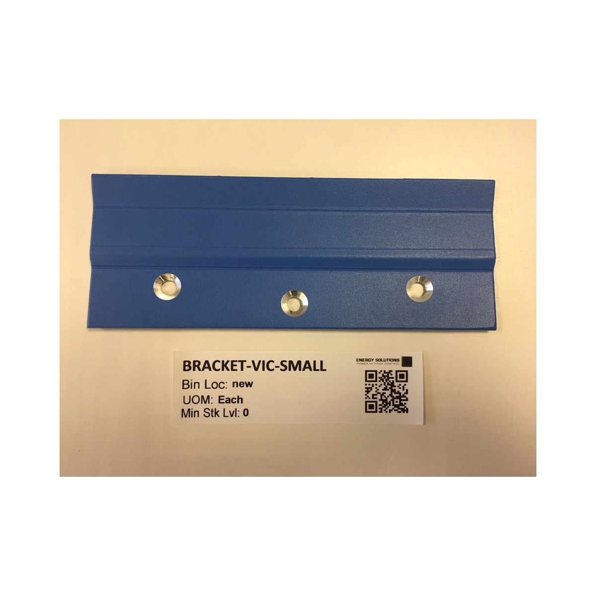 Victron BRACKET-VIC-SMALL mounting bracket for small enclosures, blue slotted bracket with a white label