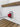 Quick FSBLD1212Y00B00 Balder BL2R P 1212F Y 1200W 12V rope only free fall, red rope fairlead on a white hull