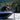 Garmin Force Kraken 010-02573-00 black trolling motor in use on a bass boat, angler landing a fish