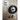 Raymarine N021 linear drive heavy duty gear kit, black gear wheel and brass gears in a pack on a grey card