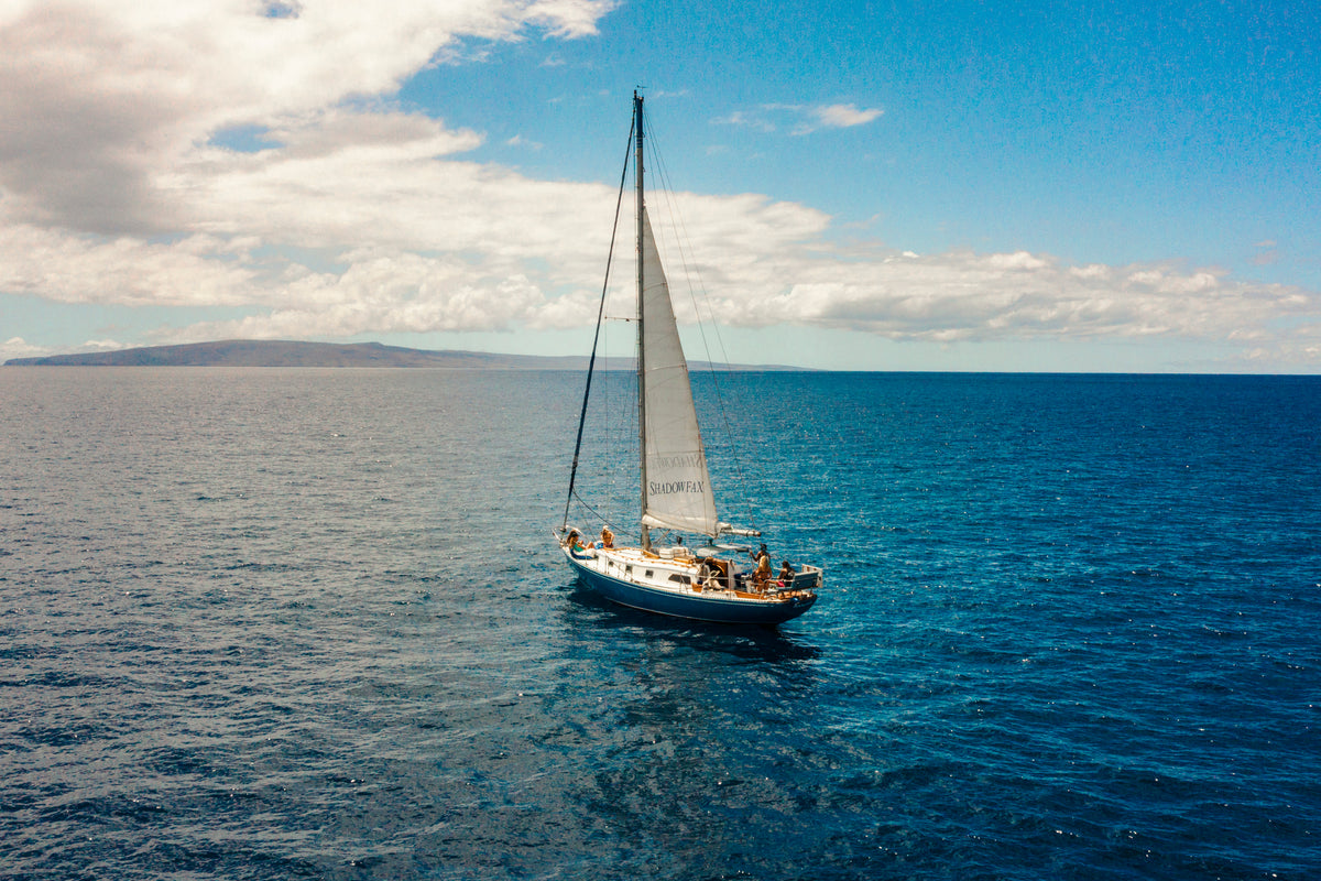 A yacht under way on open blue water